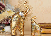 Statua animale della figurina dell'elefante di colore dell'oro dei mestieri delle decorazioni della casa della resina