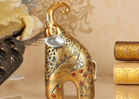 Statua animale della figurina dell'elefante di colore dell'oro dei mestieri delle decorazioni della casa della resina