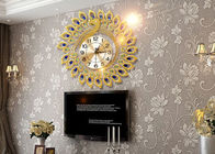 Oro di lusso dell'orologio di parete del metallo di progettazione del pavone placcato per la decorazione domestica
